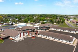 an overhead view of a school building with a parking lot at Avalon Hotel & Conference Center in Chippewa Falls