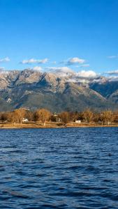 a large body of water with mountains in the background at El Joaquin in Nono +57 photos