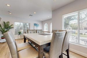 a dining room with a table and chairs at Sunshine Fun Time in Newport Beach +41 photos