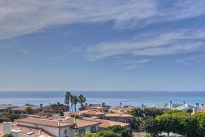 a view of a town with houses and the ocean at San Clemente - Monterey D in San Clemente +2 photos