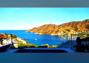 a view of a body of water with mountains at Mar en Casa - Taganga - Vista al Mar in Taganga