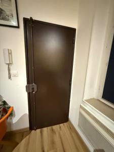 a door in the corner of a room at Le cœur du Panier in Marseille +20 photos