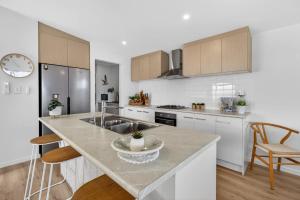a kitchen with a sink and a counter top at Marina Breeze - Excelsior Pde in Hindmarsh Island