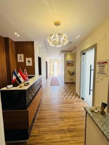 a lobby with a reception desk in a building at House Pyramids View Hotel in Cairo