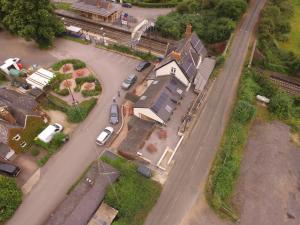 an aerial view of a house with a street at Railway Inn in Culham