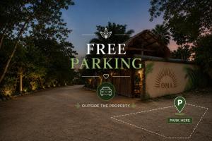 a sign that reads free parking outside a property at OMA CANCUN - Holistic Healing Center in Cancún +110 photos