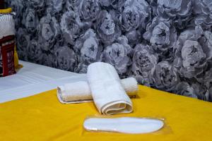 a banana and towels sitting on a table at Gabala Garden Harmony in Gabala +77 photos