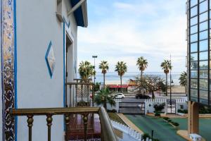 a view from a balcony of a building at Guadalupe Cozy Inns in Torremolinos