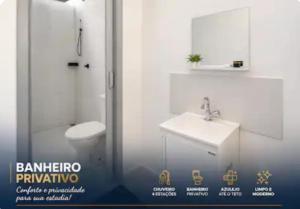 a bathroom with a white toilet and a sink at KITNET - Completa e Individual - Pousada Itapetininga in Itapetininga +18 photos
