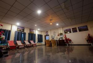 a waiting room with chairs and a table in it at Jawai Empire Resort by Premier Hotels - Luxury Tent & Cottage Stay - Leopard Safari Near Jawai Dam in Pāli