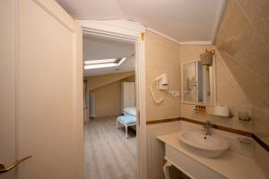 a bathroom with a sink and a mirror at Fuat Bey Palace Hotel & Spa in Istanbul +55 photos
