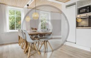 a dining room with a table and chairs at 2 Bedroom Nice Apartment In Skanderborg in Skanderborg