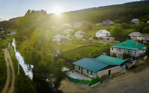 an aerial view of a village with houses at Green House -მწვანე სახლი in Tsalka