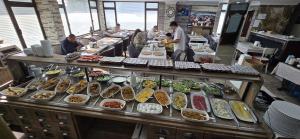 a buffet line with many different types of food at Biter Hotel in Istanbul