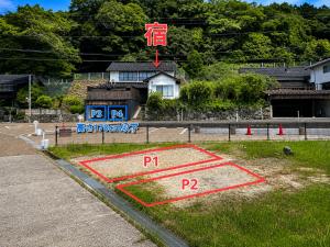a basketball court in the grass in a field at 出雲大社まで徒歩5分 一棟貸し宿 はれいろ in Izumo +9 photos