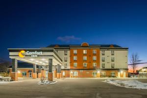 a building with a sign that reads comfort inn at Comfort Inn in Mississauga