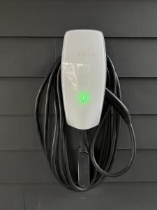 a bunch of wires hanging from a wall at Wandering Rivers Retreat in Glacier