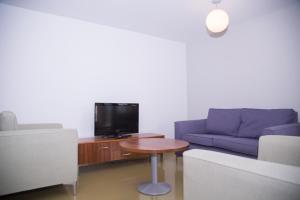 TV a/nebo společenská místnost v ubytování The Quigley Residence
