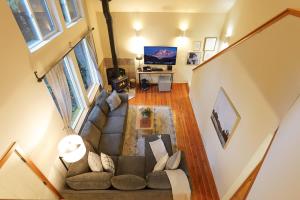an overhead view of a living room with a couch at Heliotrope Haus in Glacier