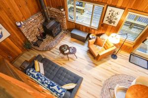 an overhead view of a living room with a fireplace at Sweet Seclusion in Glacier