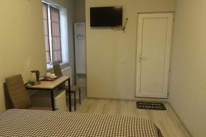 Televizors / izklaižu centrs naktsmītnē Hotel 'Lukumi'