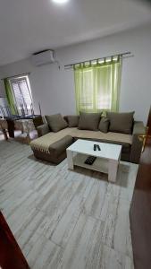 a living room with a couch and a coffee table at UnaMar 1 in Prčanj