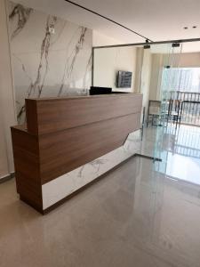 a lobby with a reception desk in a building at Nile View Plaza Hotel in Cairo