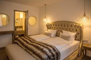 Ein Bett oder Betten in einem Zimmer der Unterkunft Spreewaldresort Seinerzeit
