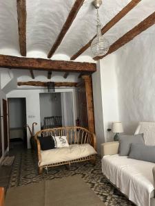 a living room with a couch and a table at Casa el Estanco in Barracas