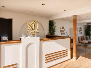 a lobby of a ski australian hotel at XU Sidi Abdel Rahman Resort & Spa in El Alamein +238 photos