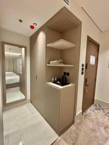 a room with a hallway with a room with a bed at فندق سدو بوتيك التحلية in Medina