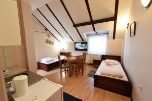 TV a/nebo společenská místnost v ubytování Apartments & Accommodation Stojic
