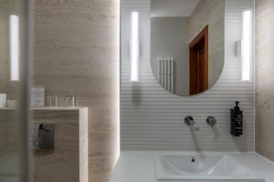 a bathroom with a sink and a mirror at Dworek Skawiński in Skawina +41 photos