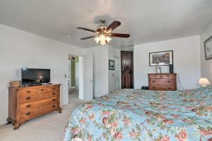 a bedroom with a bed and a ceiling fan at ATV Trail Access & Mtn Views! 2-Unit Group Retreat in Aurora