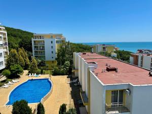 an aerial view of a resort with a swimming pool at Cozy Corner Studio in Crown Fort in Sveti Vlas