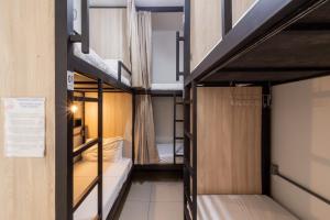 a group of bunk beds in a room at Hostel Leblon in Rio de Janeiro