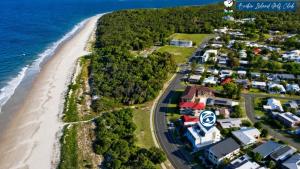 an aerial view of a beach next to the ocean at The Lookout in Woorim