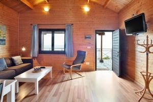 a living room with a couch and a table at Moijama 12 in Los Llanos de Aridane