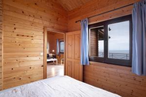 a bedroom with a bed and a window at Moijama 12 in Los Llanos de Aridane +28 photos