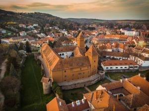 an aerial view of a town with a castle at Fogadó a Kóbor Macskához in Kőszeg +3 photos