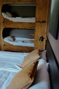 a couple of bunk beds in a room at Bjursås Bergsgård in Bjursås