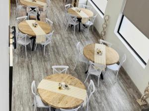 an overhead view of tables and chairs in a restaurant at Carlo's Fairview Boutique - Hotel in Walvis Bay