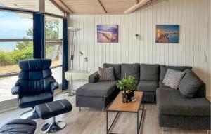a living room with a couch and two chairs at Awesome Home In Gørlev With Wifi in Gørlev
