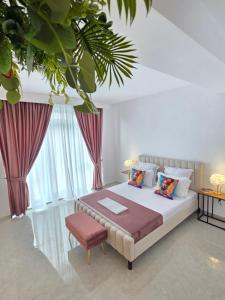 a bedroom with a bed and a large window at Chic 2 Chic Boutique in Bucharest +101 photos