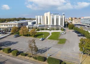 an aerial view of a parking lot in a city at Best Western Park Hotel in Piacenza