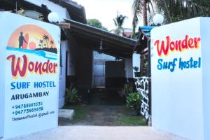 a sign for a workshop at a surf house at Wonder Surf Hostel in Arugam Bay