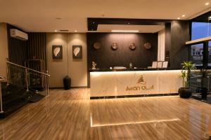 a lobby with a dance floor in a building at فندق امان أبها - المعالي in Abha