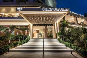 a front entrance to a port hotels building with stairs at Port Benidorm Hotel & Spa 4* Sup in Benidorm