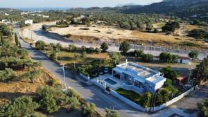 an aerial view of a house with a road at MG Villa Rhodes in Kalithies