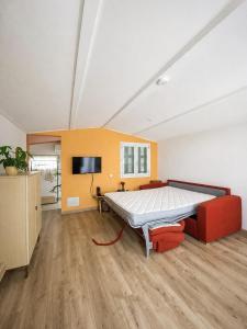 a large room with a large bed in it at Studio Smart&Cosy in Porto-Vecchio
